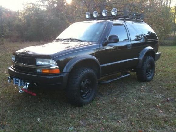 Sporting the new Synergy Offroad hidden winch plate, receiver tubes and 10k lb Smittybilt winch
