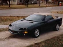 This is my car the night I drove it home from the dealership in Feburary, 1997.  It's changed so much!