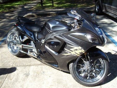 This is my latest addition... It's an 08' Suzuki GSXR 1300 Hayabusa. So far i've invested about 10k in upgrades[Stage II Turbocharger, Air ride suspension, 300 fat tire kit, Aftermarket Chromies, Purple HID's[head/ reverse lights] and the list goes on... 

As for the rest? Jus follow this link...

http://www.lightningrodder.com/forum/member.php?u=3981