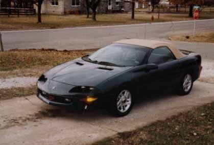 This is my car the night I drove it home from the dealership in Feburary, 1997.  It's changed so much!