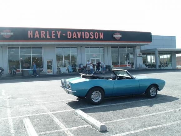 this is my camaro at the harley davidson dealer in ocean city md. where i am a member of the hog club . i also have two h d s a 1990 heritage softtail and a 2003 dresser