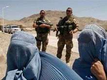 Hanging out while humanitarian aid is being dispensed Herat province
