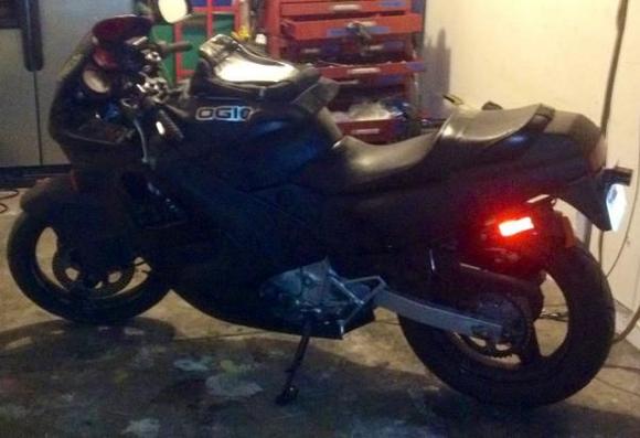 bike painted with black spray cans