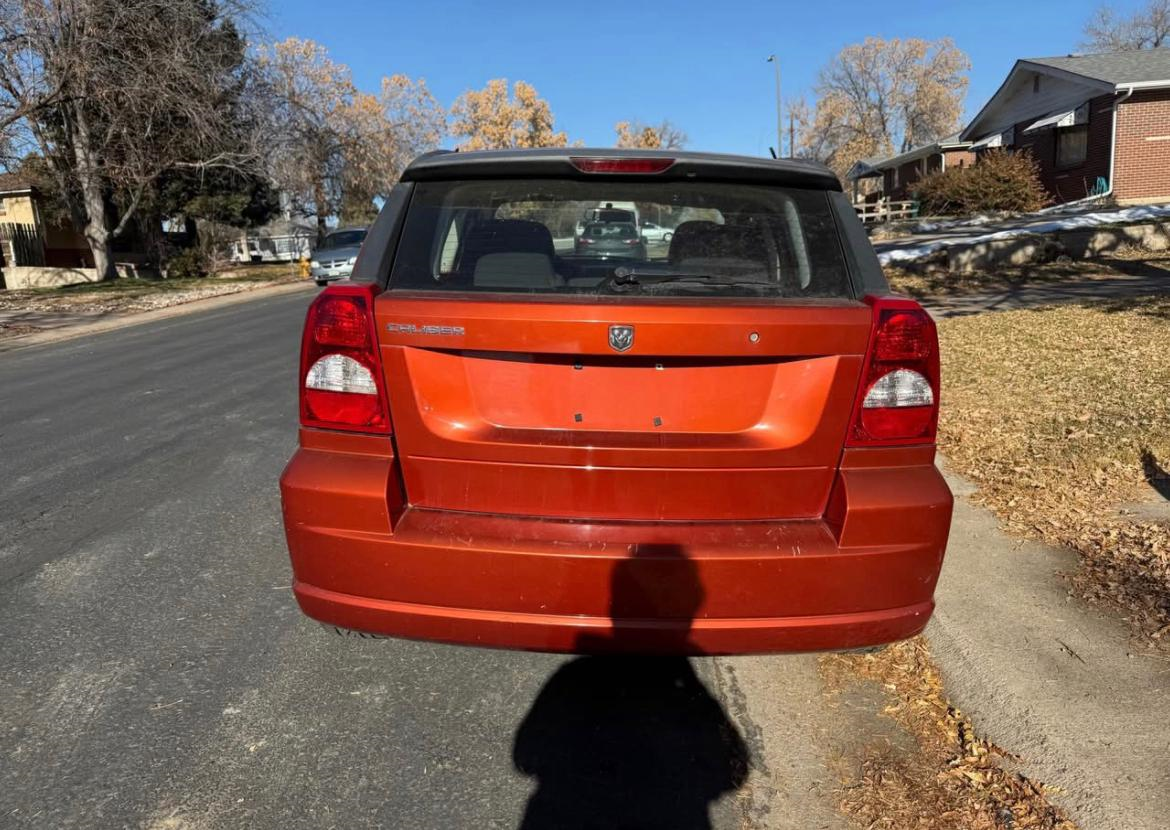 2008 Chevrolet Captiva Sport - 2008 Dodge Caliber · SE Sport Wagon 4D - Used - VIN 1B3HB28C58D747199 - 4 cyl - Manual - Red - Englewood, CO 80113, United States