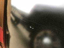 same blemish, however, hood is mechanically intact.