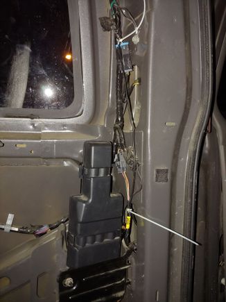 The wire connects up by the taillight connector, and then goes down to the rear door passthrough