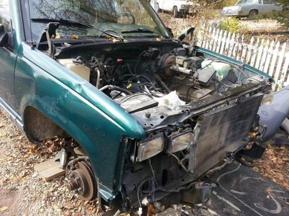 Hood off, on jackstands, motor bare ready to pull block ( previous owner stripped motor to replace head gasket)
