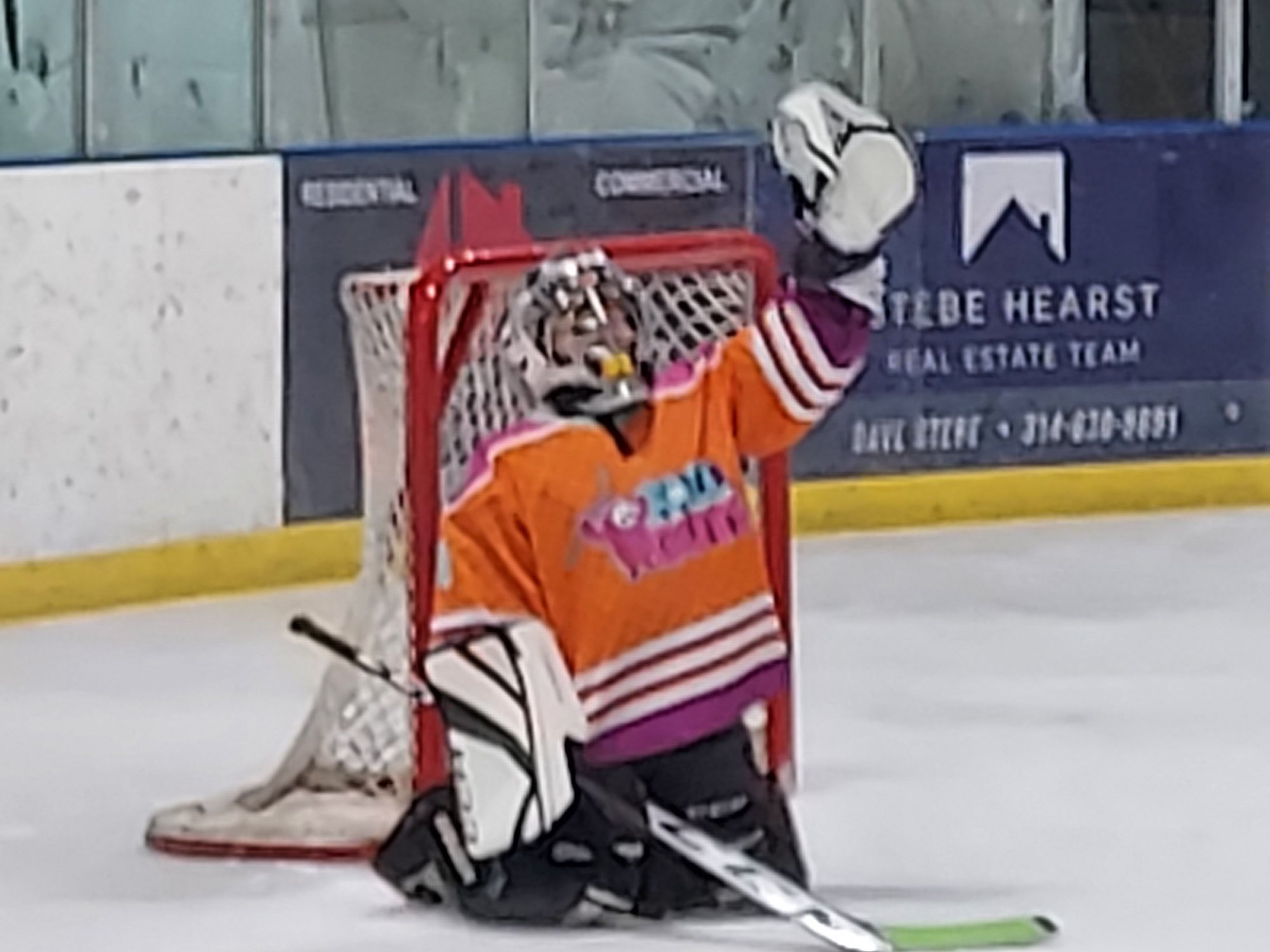 Glove save on a shot from the left Point