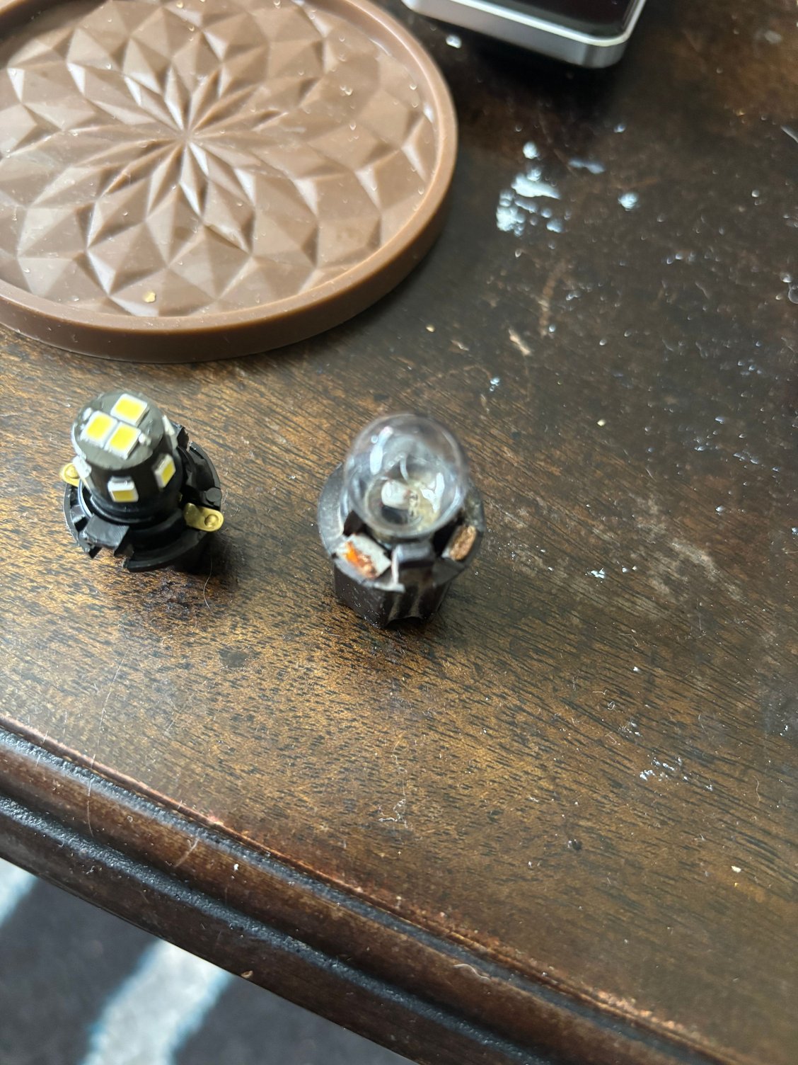 On the right is the original light and plug. You can clearly see the rust build up. On the left is the new plug and new LED light. I was initially going to clean the contacts on the original, but decided that for less than forty dollars, I can simply buy new plugs and upgrade to LEDs. It uses less power, puts out a brighter light and will likely never have to be changed in my lifetime 