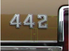 I used this pic to decide placement. To me it looks like the 442 is numeral width from the right edge and numeral height from the lip.
