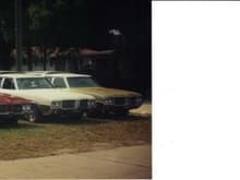 My front yard looking like a used car lot. The beige one is in the back yard mostly  disassembled . I had four Vistas, a 1969 Cutlass and the red '71, all drivers,except for the beige project car, all at the same time.