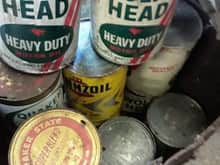 Old oil cans, most are unopened 
