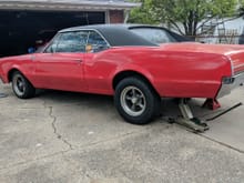 This is what my 67 looks like with the air shocks lifting the rear (ignore the jack, I was getting ready to take off the shocks). Unfortunately the car sits lopsided without any shocks so I think one of the springs is weak.