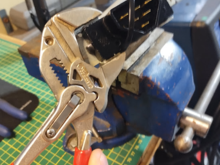 Pinched these tabs too tight. It binds the sliding mechanism when it's too tight.