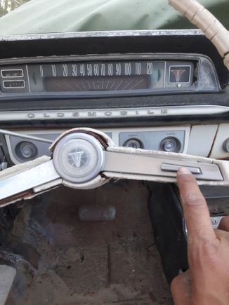 Messing with the convertable today, and found these buttons on the steering wheel. Can anyone tell me please if they have a function.