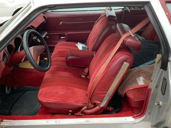 Seats are sun dried and vinyl has rips.  Carpet is new, but doesn't fit. Might be for another model.  Door cards were badly painted.  And the headliner was replaced.