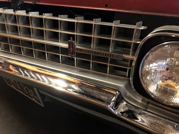 '66 98 restored grille. Polished and consistent painted contrastring surfaces