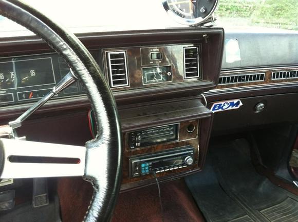 Hacked up dash and radio bezel....previous owner thought it would be cool to mount the tach to the top of the dash....