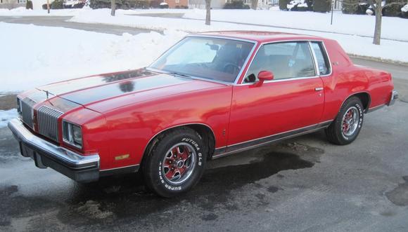 Side profile of my 1978 Calais.  The car was originally silver but the previous owner painted it in the red and black paint scheme.