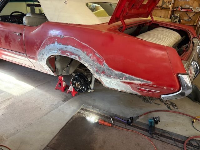 The before removal picture.  No spot welds to remove at wheel rim areas.  All rusted away.