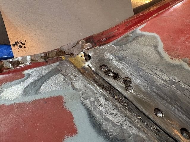 All melted out and spot welds drilled out.