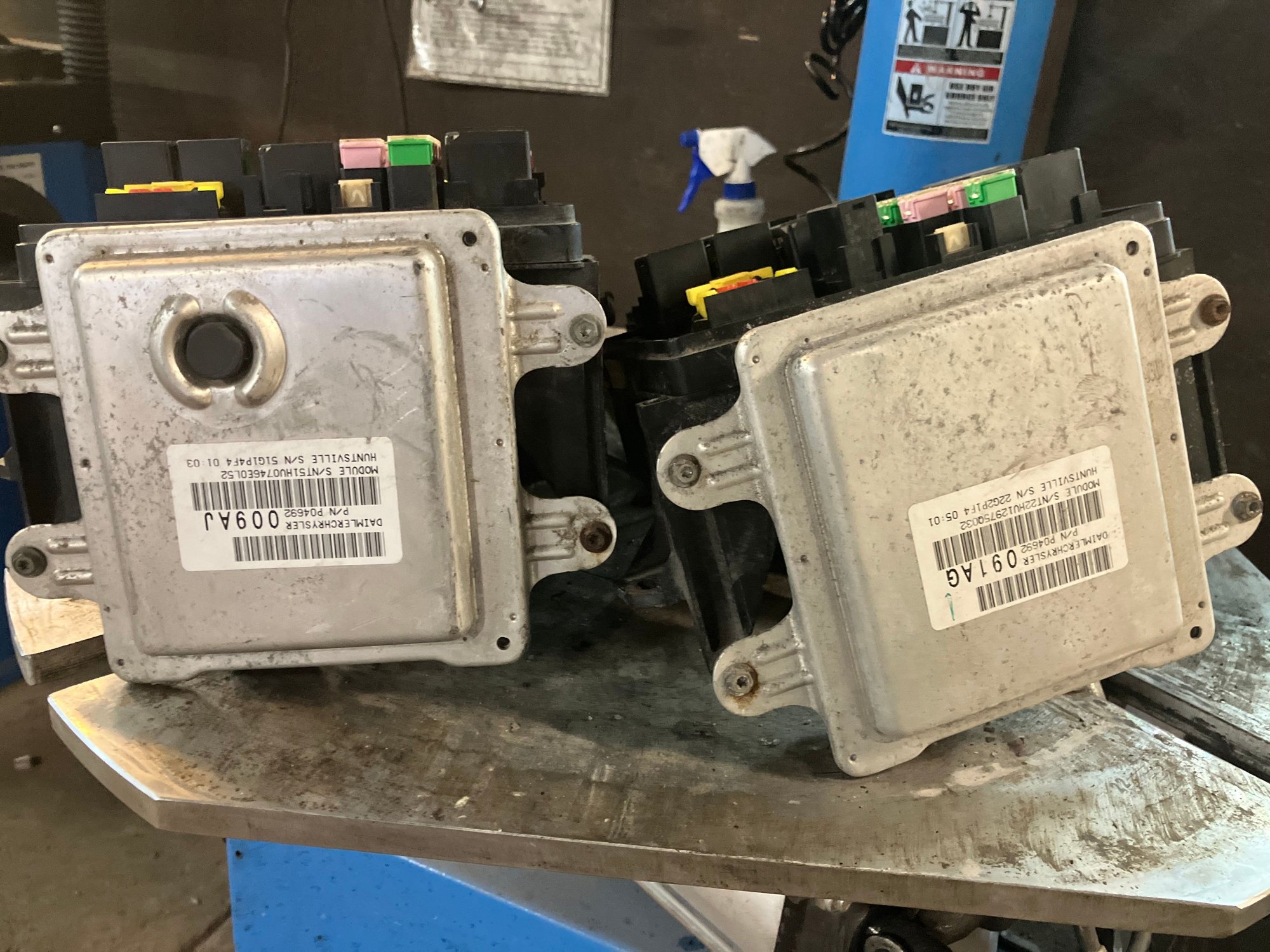 The left one is the one from the salvage yard. The right one is the stock.