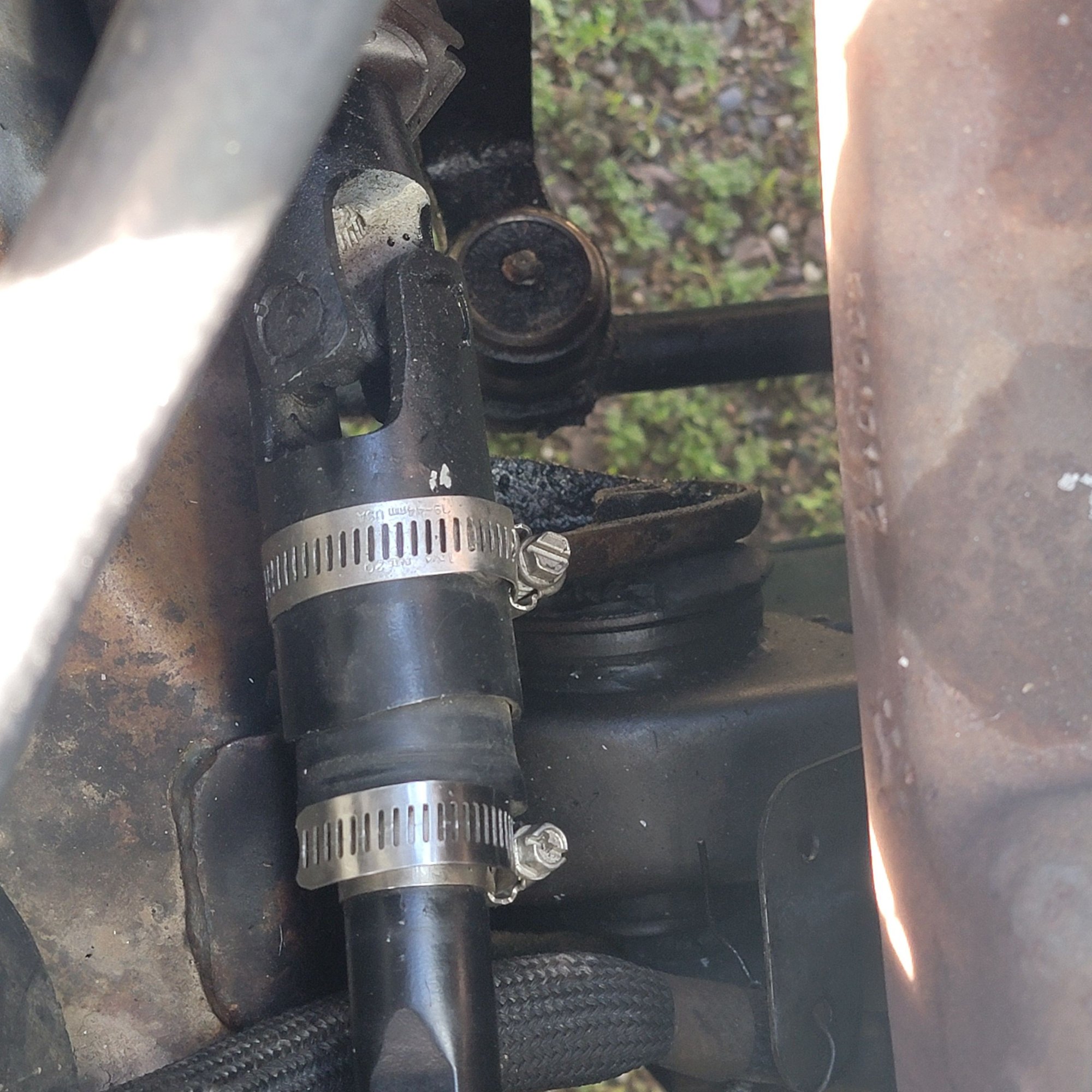 Used a part of a 3/8 pipe to make a shim for roll pin. Ill need to take it off to repair it, or stuff it back together.