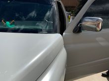 Swapping out the mirrors for the black plastic, later model Gen 2 mirrors.