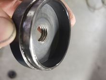 I'm swimming in import ball joint press kits similar to the Astro 7865.  This is a piece in most press kits.  I turned it down until it just fit inside the metal framework of the seal; length of this feature was .270" IIRC. I also tapped it 5/8-11 which was much easier than using a nut. 