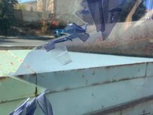 Old tint being stripped off.