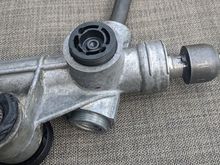 My covers use pin slots, but I didn't have one of the right size so I just drilled it out to accept the largest size pin wrench that would fit. I did need to use a breaker bar on the metal cap to get it free. Note that these caps may be staked as well (mine were) so be sure to unstake them if they are. 