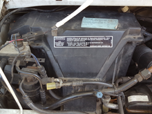 The box with the A/C ...note the rear A/C lines are cut off and sealed