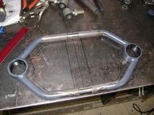 Both a-arms cut, and fit. The sharpie marks were laid out before, so you can see they are longer now. 