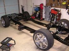 Suspension and wheels mounted. Itll squat a little with everything in. Its much lower. 
