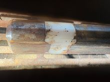 This is supposed to be underneath those holes - this is the first one (the other is out of frame to the right). I took this pic through the column "fence".