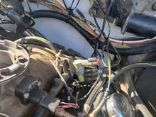 Showing in fore ground, 1/4in X 1/8in barbed adapter and vacuum hose to hard line. Yellow on purge solenoid, to hard vacuum lines moved to firewall. Maybe I can fab a shelf either under the convolted wire bundle or above it, to hold the EGR and the purge solenoid.