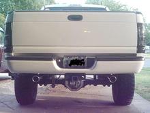 Almost finished shot of my bumper project. Just have to finish polishing it and pop the plastice inserts down.
Sharp eyes will notice I filled in the spare tire winch hole.
Oh yeah... new exhaust tips.
