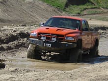Playing in the mud pit.