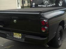 2 inch BJM lowering shackles added to the rear so the ride height in the back is now under an inch higher then the front with the standard rake and black taillight covers