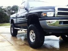 My new 5.9! Painted it myself. dual xilator turbo mufflers, No cats, spectre cold air, Gibson stainless steel headers, 50mm throttle body spacer, hughes plenum, 35 inch terra grapplers, 16 inch mickey Thompson classic III polished rims. I love my truck!