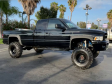 2001 RAM 2500 - V10 Magnum, 4x4, 68K miles, 6" lift front/3"rear + airbag leveling on 37"x12.0-16 Super Swamper TSL's. 
