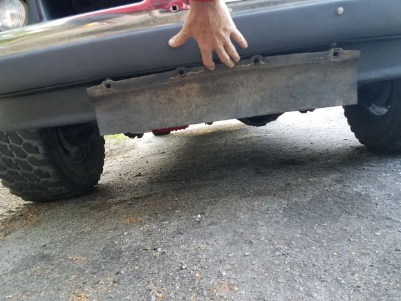 This is that rubber piece that was with the bumper at pick n pull. I could close the "jack o lantern" look and still be able to lift it up if ever needing tow hooks? No? Plasti dip it first?(ha!) Buy a new one? Leave it alone?