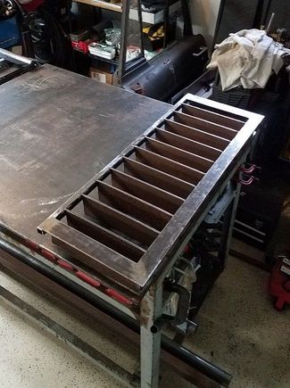 And viola. A couple of hours of cutting and grinding. The grate will mount off the side, but will be removable