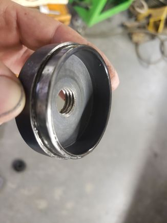 I'm swimming in import ball joint press kits similar to the Astro 7865.  This is a piece in most press kits.  I turned it down until it just fit inside the metal framework of the seal; length of this feature was .270" IIRC. I also tapped it 5/8-11 which was much easier than using a nut. 