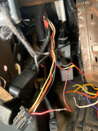 There is this random red/white wire spliced into pink/whit not sure why? And then has a cut yellow wire?