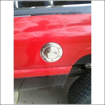 another pic of the locking door took me a whole 20 mins to put on and take the old one off seeing as i had to go to autozone to by a star head socket size 30 lol