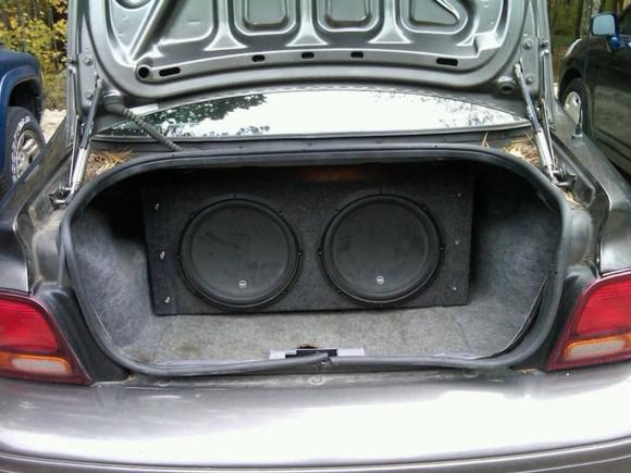 Two JL Audio W3v3's 13.5" and a A1800 amp pushing 800 watts.