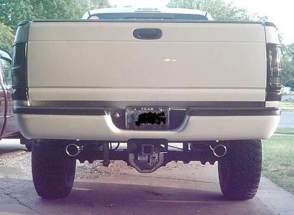 Almost finished shot of my bumper project. Just have to finish polishing it and pop the plastice inserts down.
Sharp eyes will notice I filled in the spare tire winch hole.
Oh yeah... new exhaust tips.