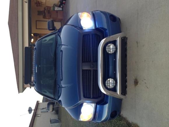 HID headlights. PLasti Dip grille and bull bar with lights.