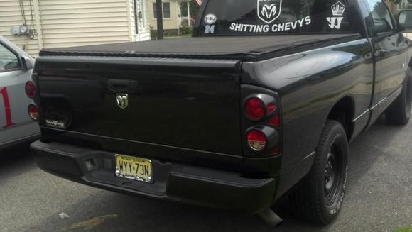 2 inch BJM lowering shackles added to the rear so the ride height in the back is now under an inch higher then the front with the standard rake and black taillight covers